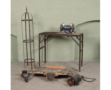 An industrial workbench, together with a separate workbench top featuring Hobbies vice, along with a National Machinery Bench