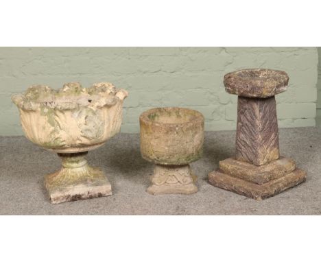 A collection of concrete garden ornaments, to include tulip bowl planter and small bird bath.  