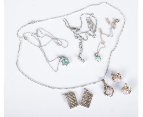 A quantity of silver and white metal jewellery. Includes opal pendant and earrings, abacus earrings, floriform aquamarine set