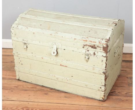 A vintage painted dome top, wooden bound trunk.  