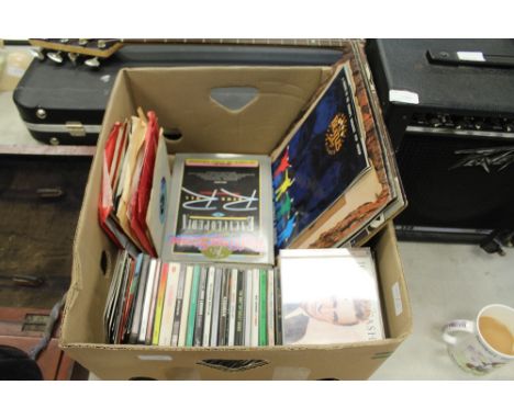 Box of music related items, CD's, Beatles, Rolling Stones book