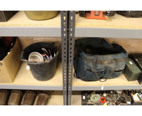 Bag of tools and bucket of fittings