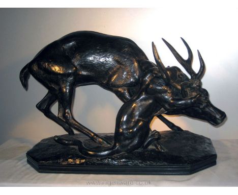 After Antoine Louis Barye; a Susse Foundry Bronze of the 'Jaguar Attacking a Stag'. Signed and with foundry mark Susse Freres