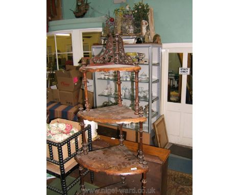 A Victorian Walnut inlaid four tier Corner Wotnot with slender turned and fluted column supports and finial top detail.  26 1