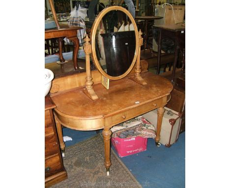 An elegant Victorian satinwood Dressing Table with oval mirror in fluted turned supports, moulded gallery back to the 'D' sha