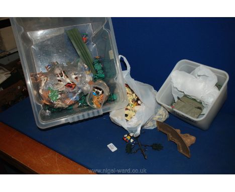 A large quantity of plastic Cowboys and Indians, farm animals, army vehicles, etc.