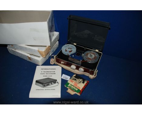 An International 4 Transistor Tape Recorder model A4411 with operating instructions and having a Scotch brand magnetic tape