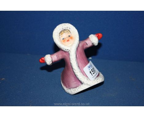 A Goebel figure of an Eskimo girl.
