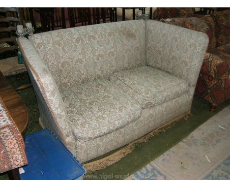 An elegant Knoll two seater Sofa with high back and arms in cream ground, urn and leaf pattern fabric.