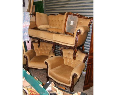 A modern Rococco style five piece show frame Lounge Suite comprising three seater sofa, two armchairs and two parlour chairs,