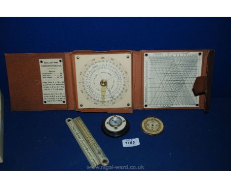 A cased Artillery Wind Correction Indicator, an old pocket Barometer and a compass set in ivory