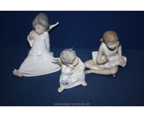 Two Lladro angel figures and a Nao Ballerina figure