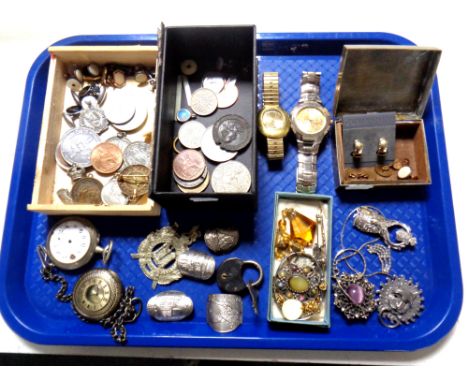 A tray containing miscellanea, including costume jewellery, wristwatches, cuff links, walking stick badges, pocket watches, a