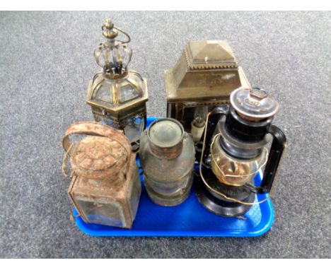 A tray of five assorted maritime, railway, oil lamps, brass wall light initialled VR, brass lantern 