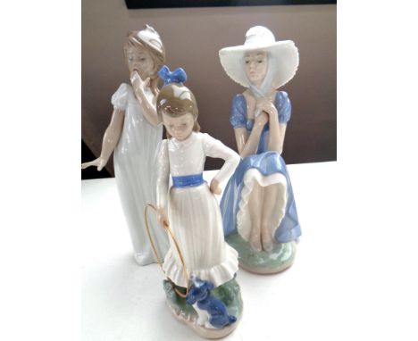 Three Nao figures of girls 