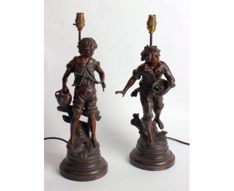 After Louis Auguste and Francois Moreau, a pair of spelter figural lamp bases, early 20th century, each with applied titles B