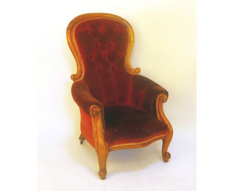 A Victorian mahogany salon chair with button upholstered back
