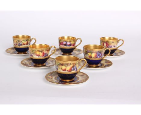 A set of six Worcester porcelain miniature cups and saucers painted broad band of summer fruit, signed L.Flexman (Cup height 