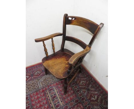 Country style ladder back armchair on turned supports and H shaped under stretcher 