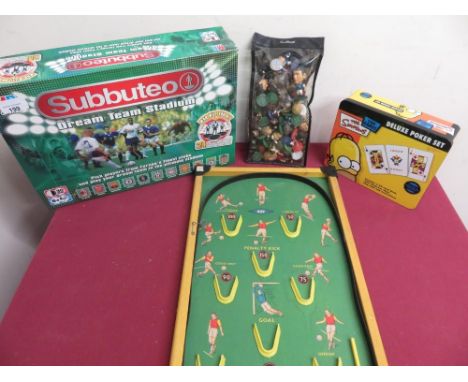 Vintage Kay Cup Final bagatelle game, Subbuteo Dream Team stadium game, collection of football game players, and a Simpsons D