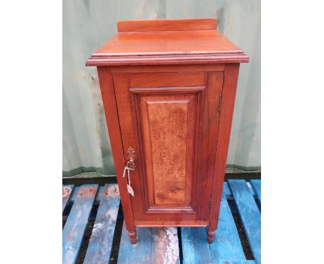 Victorian walnut bedside cabinet enclosed by single panel wooden door 