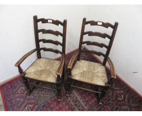 Pair of child's ladder back rush seat rocking chairs (2) 