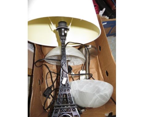 Pair of German brushed stainless steel table lamps with marble effect glass shades and a table lamp in the form of the Eiffel