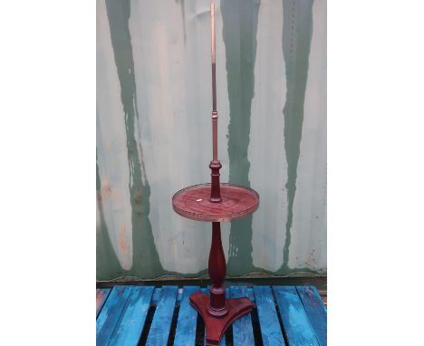 Mahogany and brass column floor lamp with circular shelf with brass pierced galley 