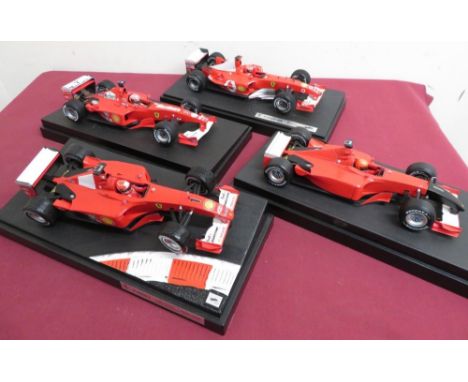 Hot Wheels  1:18 scale model Ferrari's 1200 F2000, F2001 8102/14999,  F-2001 241/750, F2003-GA, all on plinths 