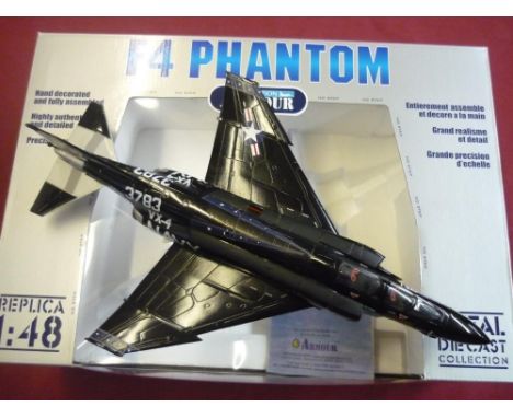 Two boxed F4 Phantom collection armour 1:48 scale diecast aircraft and another similar Franklin mint Phantom aircraft (3) 