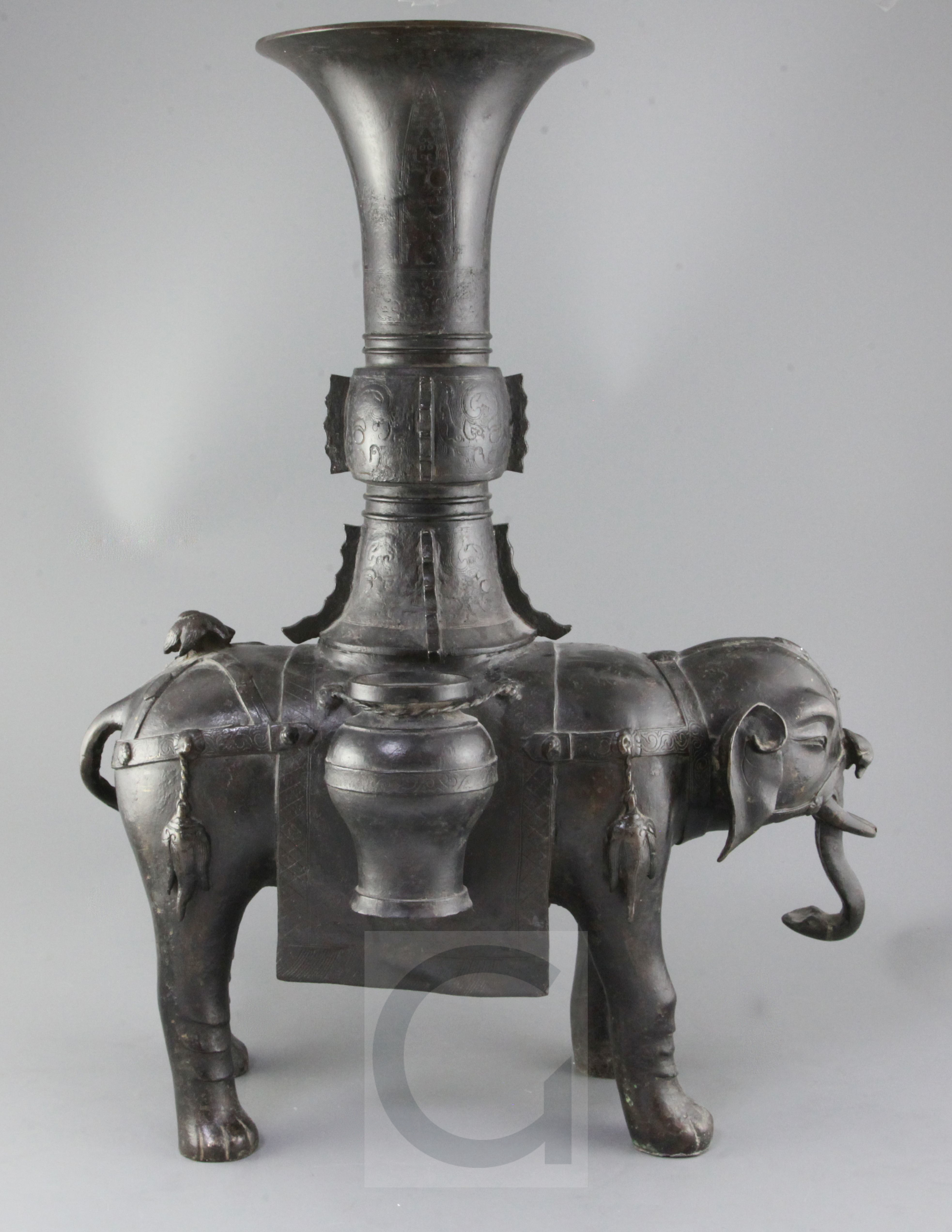 A massive Chinese bronze elephantform censer, Ming dynasty, with standing caparisoned elephant s