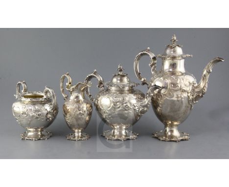 A Victorian silver four piece tea and coffee service by Edward & John Barnard, of ovoid form with engraved initial and emboss