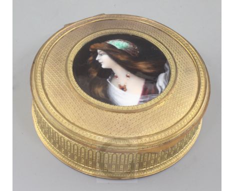 A late 19th century Palais Royale ormolu casket, inset with a Limoges enamel plaque of a lady, signed Leriche, diameter 5in.