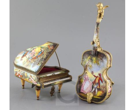 Two 20th century Viennese enamel musical boxes, in the form of a piano and a cello with stand, 6.5in. & 11.5in.