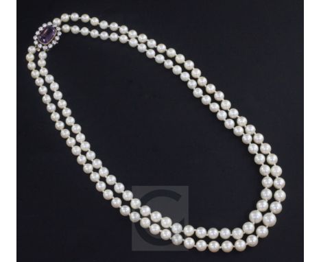 A double strand graduated cultured pearl choker necklace with gold, amethyst and white sapphire? set clasp, 48cm