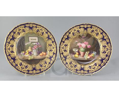 William A. Hawkins for Royal Worcester. A pair of cabinet plates, c.1917, each painted with a still life study of fruit and a