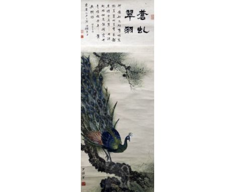 Two Chinese scroll paintings of peacocks, late Qing dynasty, the first of a peacock and peahen amid peonies, inscribed, image