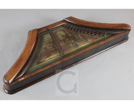 A mid 19th century Hungarian hammered dulcimer or cimbalom, with rosewood frame, inset with a panel painted with a medieval f