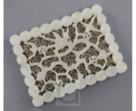 A Chinese white jade rectangular 'dragon' plaque, 17th / 18th century, the dragon amid scrolling tendrils, 5.5 x 7.4cmFrom th