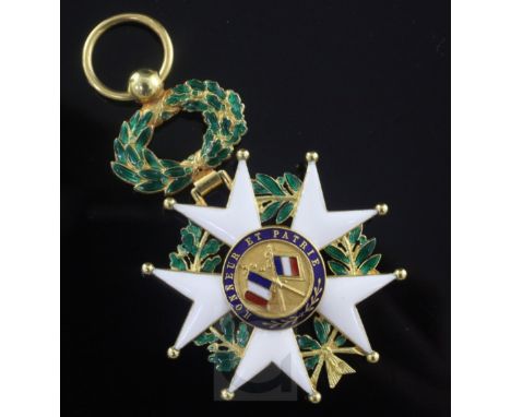 A late 19th century cased French 18ct gold and enamel Legion of Honour badge, 58mm.