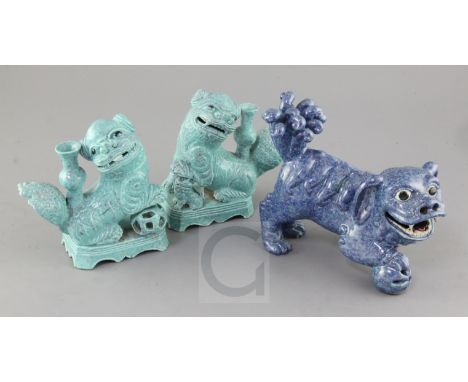 A pair of Chinese robin's egg glazed Buddhist lion jos-stick holders, and a similar figure of a lion-dog, late 19th century, 