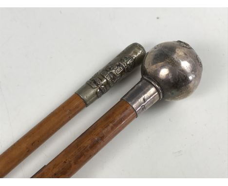 A 1920s King's Own Scottish Borderers officer's swagger stick, having spherical silver pommel, together with one other stick