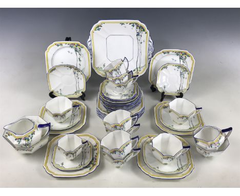 A Shelley Balloon Tree pattern Queen Anne part tea and coffee set, comprising eight tea cups and eleven saucers, three coffee