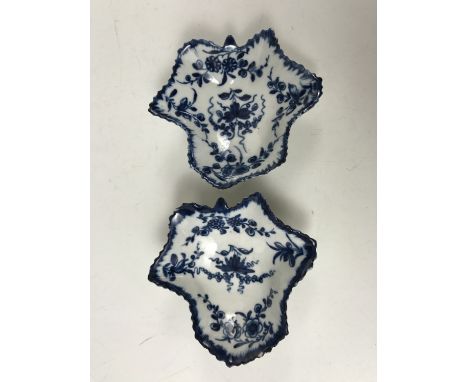 A pair of 18th Century Worcester porcelain pickle dishes, of leaf form, decorated in a fruiting vine and floral pattern, havi