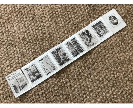 A Great War panoramic printed "concertina" booklet entitled Britain's Mighty Effort, Some Wonderful Scenes in one of England'