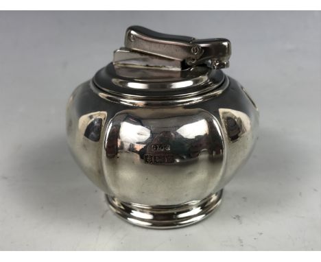 A 1960s Colibri silver table cigarette lighter