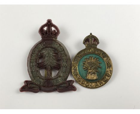 A Women's Land Army Timber Corps plastic cab badge together with a Women's Land Army enamelled badge