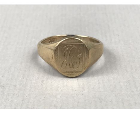 A gentleman's 9ct gold signet ring, the face engraved with a monogram, the interior bearing the inscription 'MF-JF 18.6.56', 