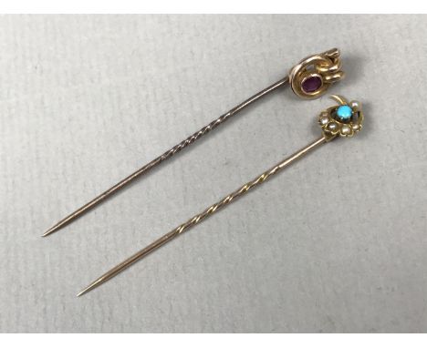 A late 19th Century amethyst and yellow-metal stick pin, stamped 9ct, together with one further similar set with turquoise an