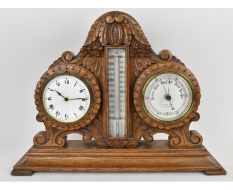 An early 20th century oak combination table clock, barometer and thermometer, having a scroll carved case raised on a stepped